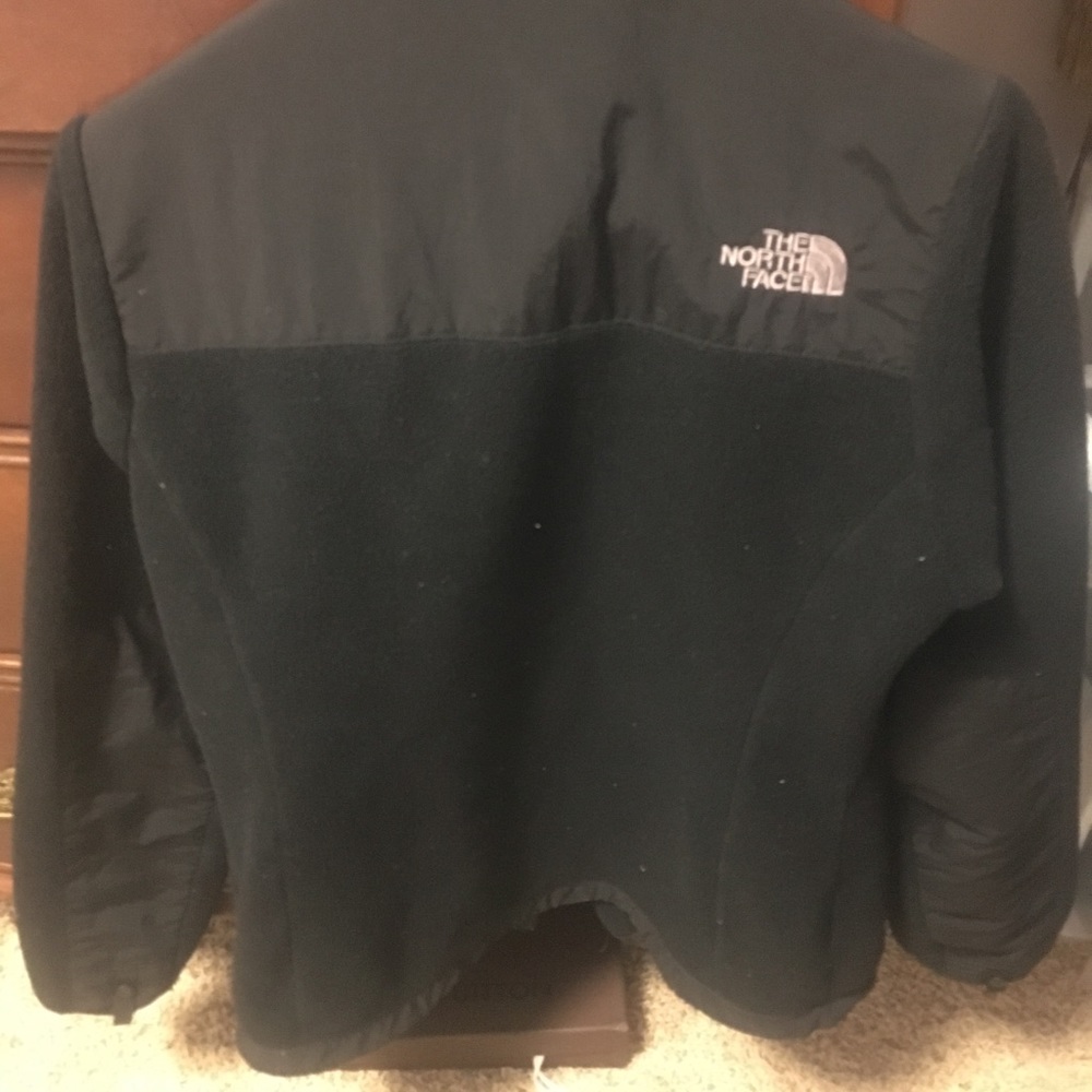 Small black North Face jacket
